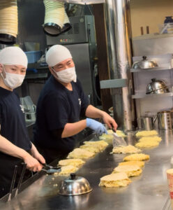 hiroshima style okonomiyaki prepared in front of you