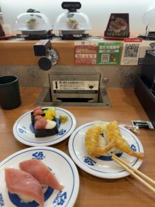 kura sushi conveyor belt sushi japan